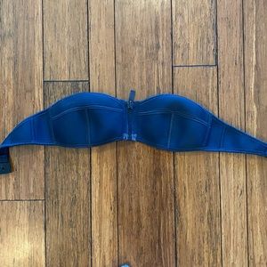 Triangl clasped top.